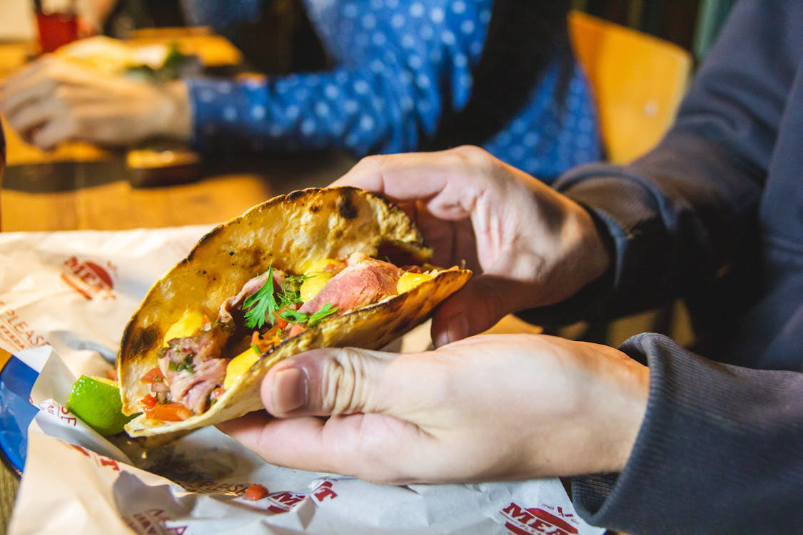 a taco with cilantro.