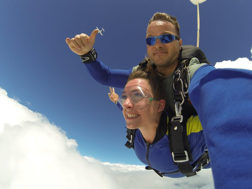 A couple skydiving together